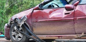 Car with damage from an accident causing a wrongful death claim.