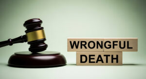 Wooden gavel and blocks spelling wrongful death